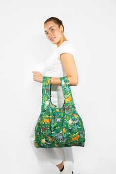 FEATURES Limited Edition 100% recycled & recyclable material shopping bag. Made from 6 recycled plastic bottles destined for our oceans. Water-resistant and lightweight. Strong stitching to carry those heavy loads up to 20kg. Large capacity fitting in 2-3 grocery bags of shopping. Folds into the attached small pouch and can fit into a pocket or handbag. Wide arms ensuring a comfortable fit around the shoulder. Bodil Jane, Grocery Bags, Small Pouch, Small Pouches, Reusable Bags, Recycle Plastic Bottles, Medium Bags, Tote Backpack, Grocery Bag