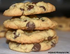 chocolate chip cookies stacked on top of each other