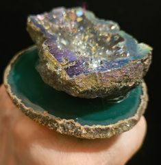 This is an older piece from my inventory which I am just now getting around to listing. I affixed a green titanium druzy geode with a gray crystallized interior onto a green Brazilian agate. The ring measures 3.25" x 3" with a height of approximately 1". This is a double band ring which will adjust to fit most, if not all. The mounts are wide, secure, comfortable and antique gun metal or deep silver tone shade. A great unisex styled statement ring from the Atelier of Kat Kouture! Large Agate Geode For Spiritual Purposes, Large Agate Geode For Spiritual Use, Unique Agate Geodes For Gift, Unique Geodes Gemstone Gift, Unique Large Stone Geodes As Gift, Large Spiritual Geode Gift, Unique Healing Gemstone Geodes, Unique Round Gemstone Geodes, Healing Gemstone Geodes