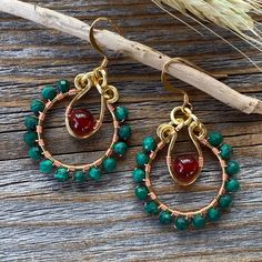 Malachite and Carnelian Beaded Hoop Dangle Earrings with a Nickel Free Ear-Wire: These earrings are light weight, comfortable, simple and fun. Throw them on with any outfit and they will definitely add some pop They are approximately 1.85 inches in length and 1 inch at the widest portion. All of these items are handmade so please allow for possible slight variance in sizing. If you would like these in a different color or size, please let me know as I also do customized orders. To view more of m Large Silver Hoop Earrings, Hoop Dangle Earrings, Original Jewelry Design, Wire Jewellery, Indie Jewelry, Hammered Earrings, Earrings Wire, Carnelian Beads, Jolly Christmas