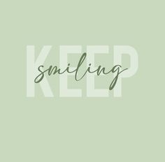 the words, keep smiling are in green and white letters on a light green background