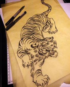 a drawing of a tiger is shown on paper