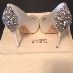 Badgley Mischka Rhinestone Satin Pumps 4.8” Heel Covered With Rhinestones Peep Toe Reveals Partially Hidden 1” Platform Leather Sole Ivory Satin Only Worn Once Size 7 Badgley Mischka Shoes, Satin Pumps, Wedding Heels, Platform Pumps, Badgley Mischka, Bridal Shoes, Wedding Shoes, Shoes Women Heels, Women's Shoes