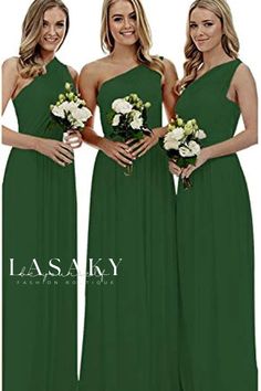 three bridesmaids in green dresses posing for the camera with their bouquets and flowers