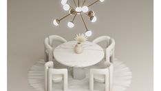 a white table with chairs and a chandelier hanging from it's ceiling