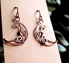 simple, lightweight & earthy earrings crafted with hand formed & hammered, 18g, antiqued copper crescent moons with swirly accents ✨  moons are 1" tall choose your hypoallergenic hooks! Cold Connection Jewelry Ideas, Wire Wrapped Moon Shaped Earrings, Handmade Adjustable Half Moon Earrings, Handmade Half Moon Earrings, Adjustable Moon-shaped Minimalist Earrings, Unique Handmade Moon-shaped Earrings, Crescent Wire Wrapped Earrings As Gift, Crescent Wire Wrapped Earrings For Gift, Moon Shaped Wire Wrapped Earrings Gift