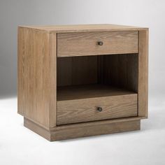 a wooden night stand with two drawers on one side and an open drawer on the other