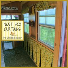 the inside of a chicken coop with yellow and green curtains on it's windows