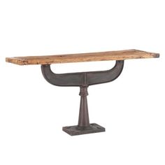 an iron and wood table with a wooden top on it's legs, against a white background