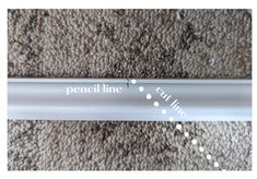 a white pipe with the word pencil line cut out on it's side, laying on carpet