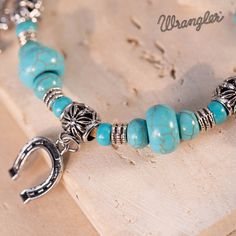 Wrangler Leather Turquoise Stone beads Bracelet Material：Silver-tone metal and turquoise stones Nickel-free Turquoise Beaded Bracelets For Festivals, Southwestern Turquoise Nickel-free Beaded Bracelets, Southwestern Turquoise Nickel Free Beaded Bracelets, Nickel-free Southwestern Turquoise Beaded Bracelets, Nickel-free Turquoise Beaded Bracelets, Southwestern Style, Turquoise Stones, Wallet Shop, Crossbody Tote, Beads Bracelet