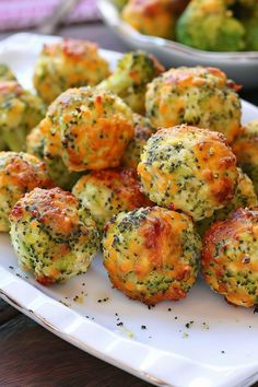 broccoli and cheese balls on a white plate