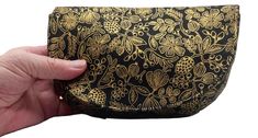 A stylish women's clutch bag is the perfect accessory for any occasion. This elegant clutch purse is designed to fit all phones up to 7 inches long, ensuring you stay connected while looking fabulous. Crafted with a coordinating interior fabric, it adds a touch of sophistication to your evening bag collection.  * Magnetic snap closure * Interfaced for style and body * Coordinating cotton fabrics with gold metallic accents *7" wide by 5" tall and 3" deep The bag is expertly interfaced for great body and shape, making it both fashionable and functional. Elevate your outfit and make a statement with this versatile clutch bag that meets all your needs for a night out or a special event. Don't miss out on this must-have accessory! **Each bag is individually made, so the location of fabric patte Iphone Purse, Smartphone Bag, Elegant Clutch, Bag Fabric, Clutch Purse Evening, Small Clutch, Evening Handbag, Bag Collection, Ladies Clutch