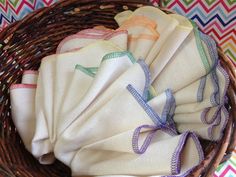 several napkins in a basket on a table