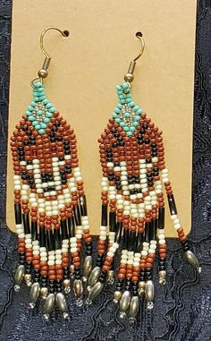 Hand-made Beaded Earrings  -Czech beads (reddish-brown, black, white, sky blue) Southwestern Brown Beaded Earrings With Round Beads, Southwestern Style Brown Beaded Earrings, Southwestern Brown Dangle Beaded Earrings, Brown Large Beaded Dangle Earrings, Brown Large Beads Dangle Earrings, Brown Dangle Beaded Earrings With Large Beads, Southwestern Style Colorful Beaded Earrings In Brown, Red Wolf, White Sky