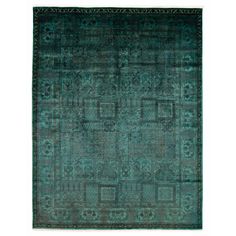 a green rug with an intricate design on the top and bottom, surrounded by smaller squares