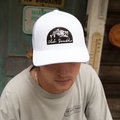 Keeping the hot southern sun out of your eyes and away from your face is important during the heat of June, July and August--both for guys and gals. Our classic, wide-brimmed trucker hat subtly announces your southern roots while shading your head and face. Crown: Structured Pro Crown | Pro-Stitched Finish | Adjustable Snap-Back Visor: Pre-Curved | Curved or Flat - Shape It How You WantSweatband: 3-Part Comfort Cotton FitClosure: Plastic Adjustable Snap-Back Sizes: Adult | One Size Fits Most Dress Purse, Months Of The Year, Flat Shapes, Brand Story, Top Graphic Tees, Snap Backs, Months In A Year, Wide Brimmed, Rompers Women