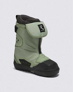 the snowboard boots are green and have black outstracks on each soles