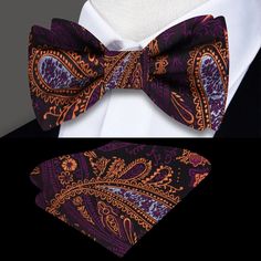 Purple and Orange Paisley Bow Tie Looking to elevate your style with a unique and eye-catching accessory? Look no further than our luxurious purple and orange paisley bow tie, paired with a stunning purple and gold accenting pocket square. This bow tie is the perfect way to add a pop of color and sophistication to any outfit, whether you're attending a formal event or simply looking to spice up your everyday attire. Crafted from the highest quality materials, this paisley bow tie is both comfort Purple And Gold Bow Tie, Gold Pocket Square, Suit Handkerchief, Types Of Bows, Tie Matching, Silk Bow Ties, Purple And Orange, Tie Colors, Bright Lights