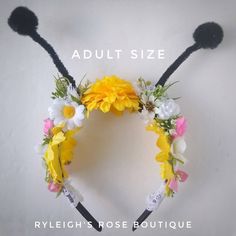 These adorable headbands are handcrafted with high quality flowers in yellow and white (bumble bee) or red, white and black (lady bug). Set on a black U shaped headband with black fuzzy antenna's. Perfect for parties and for ages 1 and up! (will fit tighter on adults) Have a special request? I specialize in floral accessories and decor so check out the rest of my shop and other hair bows! I can make floral accessories and decor for anyone! Great for new born and baby photos, brides and bridesmai Cute Flower Headband For Spring, Spring Gift Headband In Whimsical Style, Handmade Adjustable Headband For Costume, Playful Spring Headband As A Gift, Whimsical Spring Headband For Gift, Whimsical Spring Headband Gift, Whimsical Spring Headband As Gift, Bee And Flower Costume, Adjustable Yellow Headband As Gift