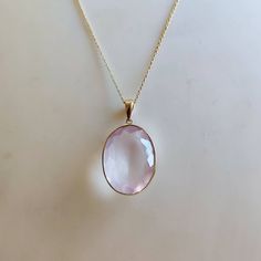 ITEM DESCRIPTION: >>The pendant is made from Solid 14K Yellow Gold. Gemstone used is absolutely natural and ethically sourced. >>Natural Rose Quartz in bezel setting is studded on it with utmost precision. >>This is a minimalist design and is absolutely hassle-free and everyday jewelry. Gem: Rose Quartz Gem size: 15.5x21.5 mm Gem weight: 14.5 carats Gold purity: 14K (58.33% approx.) Gold weight: 0.63 grams Gross weight: 3.60 grams The Gold purity is guaranteed and it comes with authentic 14K gol Luxury Pink Gemstones For Gift, Elegant Pink Gold Jewelry With Bezel Setting, Fine Jewelry Faceted Gemstones For Gift, Faceted Gemstones For Gifts, Fine Jewelry Style, Faceted Gemstones For Gifts - Fine Jewelry, 14k Gold Briolette Gemstones For Gift, Faceted Gemstones For Fine Jewelry Gifts, Classic Pink Gemstones For Gifts, Pink Gold Jewelry With Bezel Setting For Formal Occasions