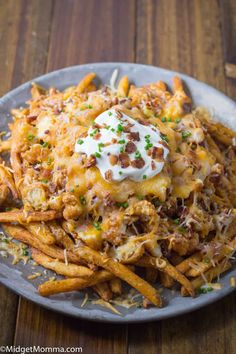 chicken bacon ranch cheesy fries on a plate