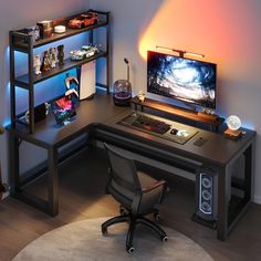 a computer desk with a monitor and keyboard on it