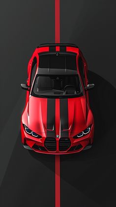 an overhead view of a red sports car with black stripes on the front and side