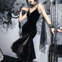 Indulge in the dark and decadent glamour of our Black Gothic Lace Velvet Flare Midi Dress. Crafted from luxurious, form-fitting black velvet, this dress is adorned with delicate lace trim and thin straps, while sheer lace panels add an alluring touch of mystery. Slightly flaring towards the bottom, it creates a flattering silhouette, perfect for Gothic and Halloween-inspired events. Luxurious black velvet fabric Delicate lace trim with sheer lace panels Thin straps for an elegant look Slightly f Goth Subcultures, Elegant Mermaid Dress, Random Outfits, Velvet Dress Long, Gothic Cross, Velvet Flares, Dark Style, Fishtail Dress, 2022 Trends