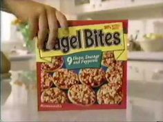 a person holding up a bag of angel bites cereal in front of a counter top