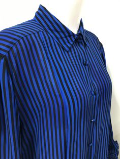 "Vintage black and blue striped blouse by  'The Bay'. Beautiful condition! 100% polyester, sized as a 16.  Measures 17\" across shoulder, 22\" pit to pit, 29\" long." Cheap Retro Blue Blouse, Blue Vertical Striped Shirt For Work, Blue Vertical Stripe Shirt For Work, Black Formal Top With Striped Collar, Casual Black Blouse With Vertical Stripes, Blue Striped Shirt For Work, Black Casual Blouse With Vertical Stripes, Formal Black Top With Striped Collar, Blue Vertical Striped Collared Top