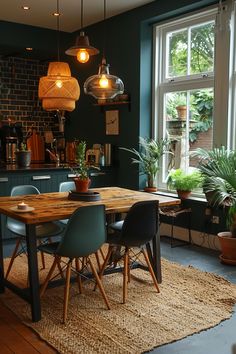 a dining room table surrounded by chairs and potted plants in front of a large window