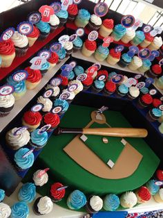 cupcakes are arranged in the shape of a baseball field