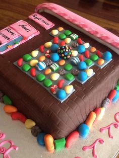 a birthday cake decorated with candy and candies