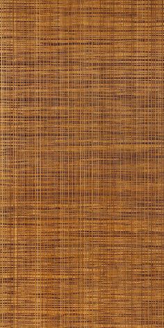 a close up view of the textured bamboo wallpaper in this photo, it looks like woven fabric