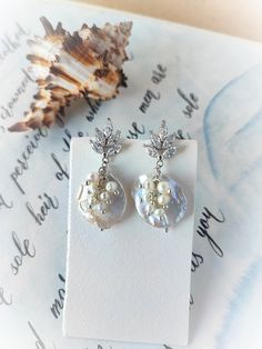 Baroque Pearl Earrings, Large pearl earrings, Big Pearl Earrings, Real pearl earrings, Iridescent White Pearl, coin pearl earrings by JewelryFashionArt on Etsy Glamorous Pearl Earrings As Gift, Glamorous Pearl Embellished Earrings As Gift, Glamorous Pearl Embellished Earrings For Gift, Round Pearl Charm Bridal Earrings For Wedding, Bridal Round Pearl Charm Earrings For Wedding, Round Bridal Earrings With Pearl Charm For Wedding, Party Pearl Drop Earrings Made Of Mother Of Pearl, White Pearl Button Earrings For Wedding, Pearl White Mother Of Pearl Wedding Earrings