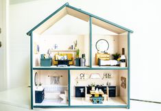 a doll house with all the furniture in it