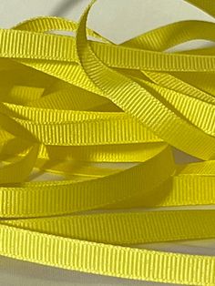 bright yellow ribbon on white background