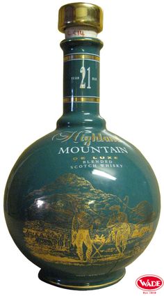 a bottle of mountain gin is shown on a white background