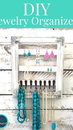 a jewelry organizer with turquoise and white beads