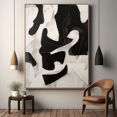 an abstract painting hangs on the wall next to a chair