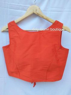 Women Saree Blouse, Indian Sari Blouse, Sari Blouse, Women Blouse, Crop Top For Women, Saree Blouse, Fancy Crop Top, Bollywood Blouse Description: Fabric: Raw Silk Color: Same As Pic Back Open Blouse Available In Many Colors Lowest Price Sleeveless Orange Cotton Blouse, Fitted Orange Cotton Blouse, Fitted Sleeveless Orange Blouse, Red Cotton Padded Blouse Top, Red Cotton Top With Padded Blouse, Fancy Crop Top, Black Saree Blouse, Saree Bluse, Blouse Sari