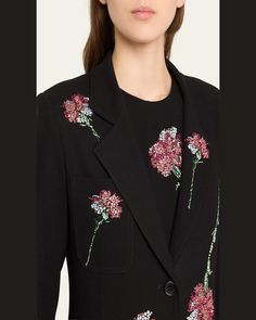 Libertine "Cecil Beaton" maxi coat features pink carnation embellished details throughout     Notched collar     Button closure     Long sleeves    Front patch pockets     Full length    Relaxed fit    Wool    Lining: Polyester    Dry clean    Made in USA Embellished Outerwear For Work, Fall Embellished Outerwear With Notch Lapel, Chic Long Sleeve Blazer With Floral Embroidery, Elegant Floral Embroidered Outerwear For Work, Spring Embellished Workwear Outerwear, Spring Embellished Outerwear For Work, Tailored Embellished Spring Outerwear, Embellished Denim Jacket, Cecil Beaton