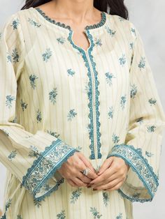 Brand: edenrobe Product: EWU24A1-29471-3PCollection: Allure Lawn Unstitched - Spring Summer CollectionFabric: Lawn DESIGN DETAILS: 3M Printed Lawn Shirt 2.5M Printed Lawn Dupatta 1.8M Dyed Trouser DISCLAIMER:* Lining, Laces, and Tassels are not included in unstitched variants.* Embellishment items in stitched outfits are subject to market availability.* The actual colors of the outfit may vary from the colors being displayed on your device. CARE INSTRUCTIONS: Extra Fabric Has Been Used For Shoot Original Color May Vary Slightly From The Picture Dry Clean Recommended Iron The Clothes At Moderate Temperature Do Not Use Bleach, Or Stain Removing Chemicals Damp Fabric Should Not Be Exposed To Sunlight edenrobe Allure Lawn Spring Summer Collection Authenticity Guaranteed – 100% Original Brand 3 Elegant Semi-stitched Lawn Suit With Printed Motifs, Elegant Palazzo Set With Straight Kurta And Floral Embroidery, Elegant Floral Embroidered Sets With Straight Kurta, Elegant Floral Embroidery Sets With Straight Kurta, Elegant Cambric Palazzo Set With Dabka Work, Elegant Straight Kurta Set With Floral Embroidery, Elegant Sets With Floral Embroidery And Straight Kurta, Elegant Festive Cambric Palazzo Set, Elegant Floral Embroidered Lawn Suit For Eid