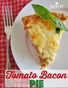 a piece of pizza on a white plate with a fork and red checkered table cloth