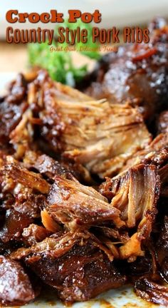 a close up of food on a plate with meat and broccoli in the background