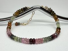 welcome to my little shop handmade by me https://embraceletgifts.etsy.com Watermelon tourmaline bracelet.  High quality colorful faceted rondell. The color ranges from dark to light pink, orange, yellow, blue and green.  Gold filled findings.  Tourmaline is connected with the Heart Chakra. It restores the balance and helps to inspire creativity and self expression. It is also said to help attract love and aid in resolving romantic issues. Beads size: 3.7-4mm Available in 2 lenght with 1 inch 14k Pink Orange Yellow, Tourmaline Bracelet, Inspire Creativity, Watermelon Tourmaline, October Birthstone, Grade 3, October Birth Stone, Heart Chakra, Green Gold