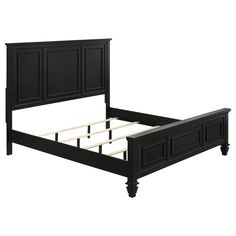 a black bed frame with white headboard and foot board on the bottom end, in front of a white background