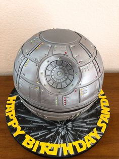 a star wars themed birthday cake on a table