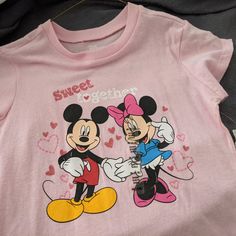 Brand New With Tags. Never Worn. Disney Short Sleeve , Very Cute Girls' Pink T Shirt With Mickey And Minnie!! Size 7/8 Playful Cartoon Print T-shirt For Disney Trips, Disney Minnie Mouse Pink T-shirt, Pink Fun T-shirt For Disney Fan Events, Cute Pink Minnie Mouse T-shirt, Pink Cotton Minnie Mouse Tops, Casual Pink Minnie Mouse Top, Character Style Cotton Short Sleeve Tops, Pink Minnie Mouse T-shirt For Disney Fan Events, Disney Pink Minnie Mouse T-shirt